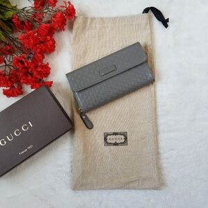 Authentic GUCCI  Microguccissima Continental Wallet